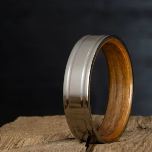 Double grooved satin titanium and Whiskey barrel wood ring