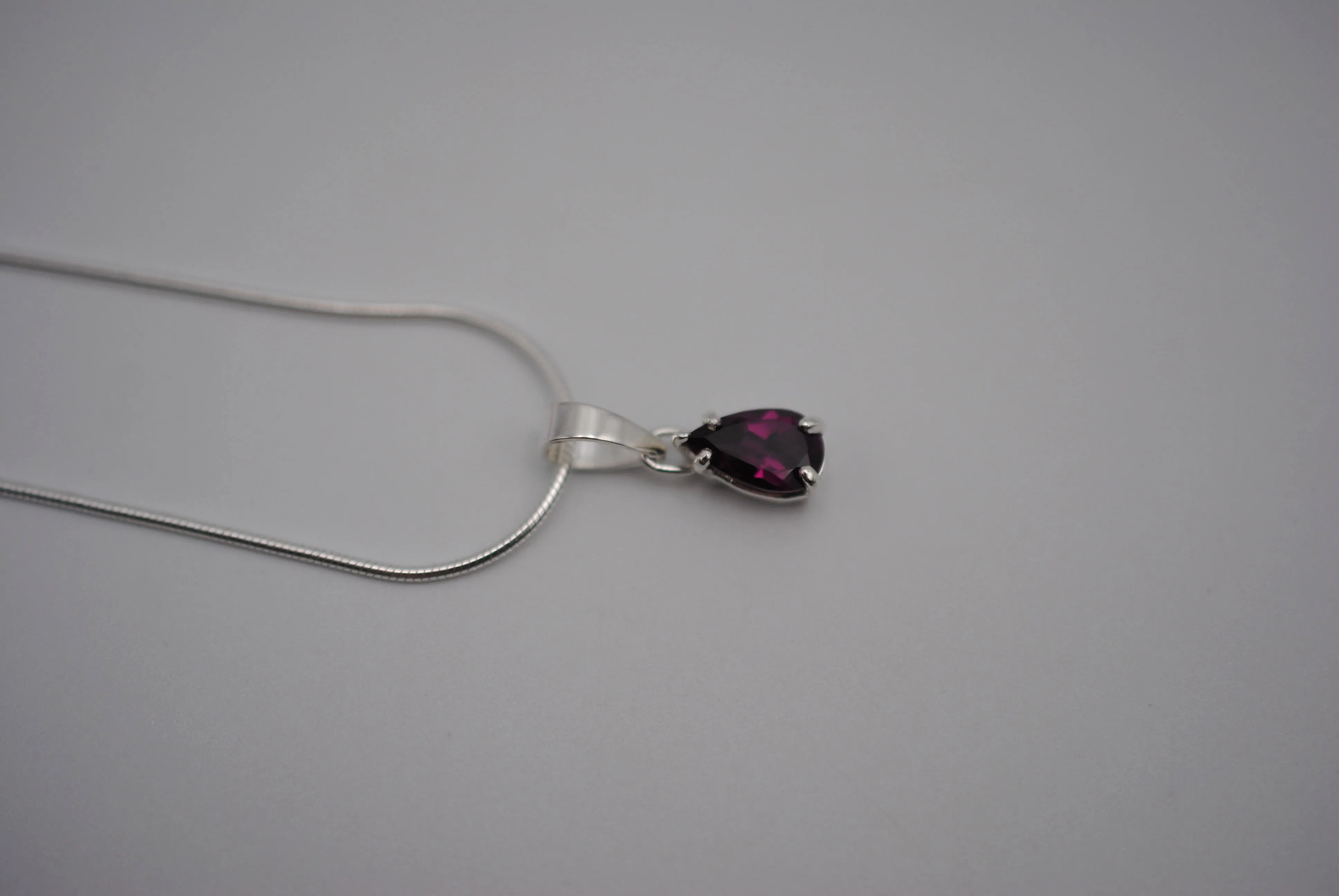 Rhodolite Garnet Necklace: Pear Cut, Silver Setting, Snake Chain