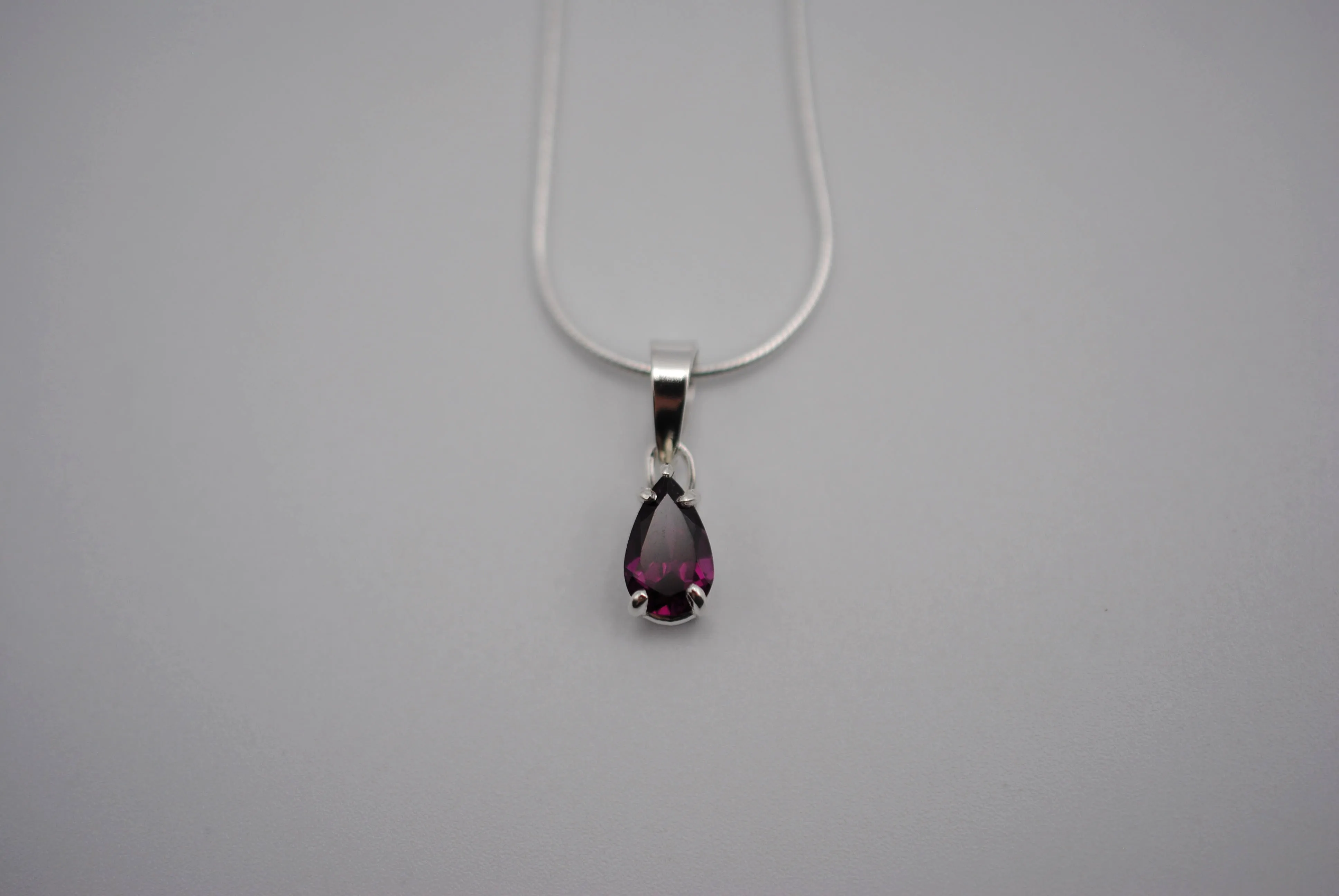 Rhodolite Garnet Necklace: Pear Cut, Silver Setting, Snake Chain