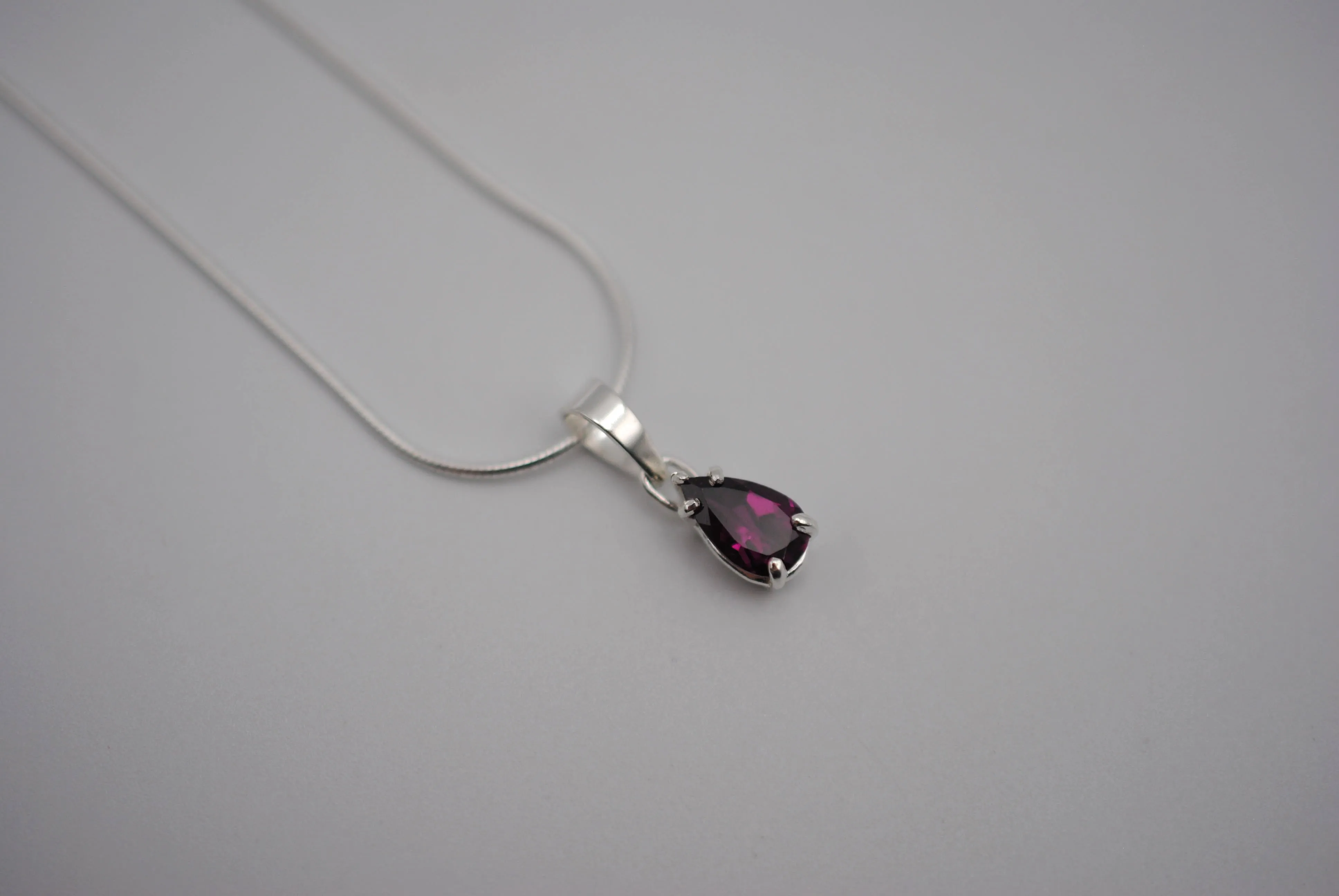 Rhodolite Garnet Necklace: Pear Cut, Silver Setting, Snake Chain